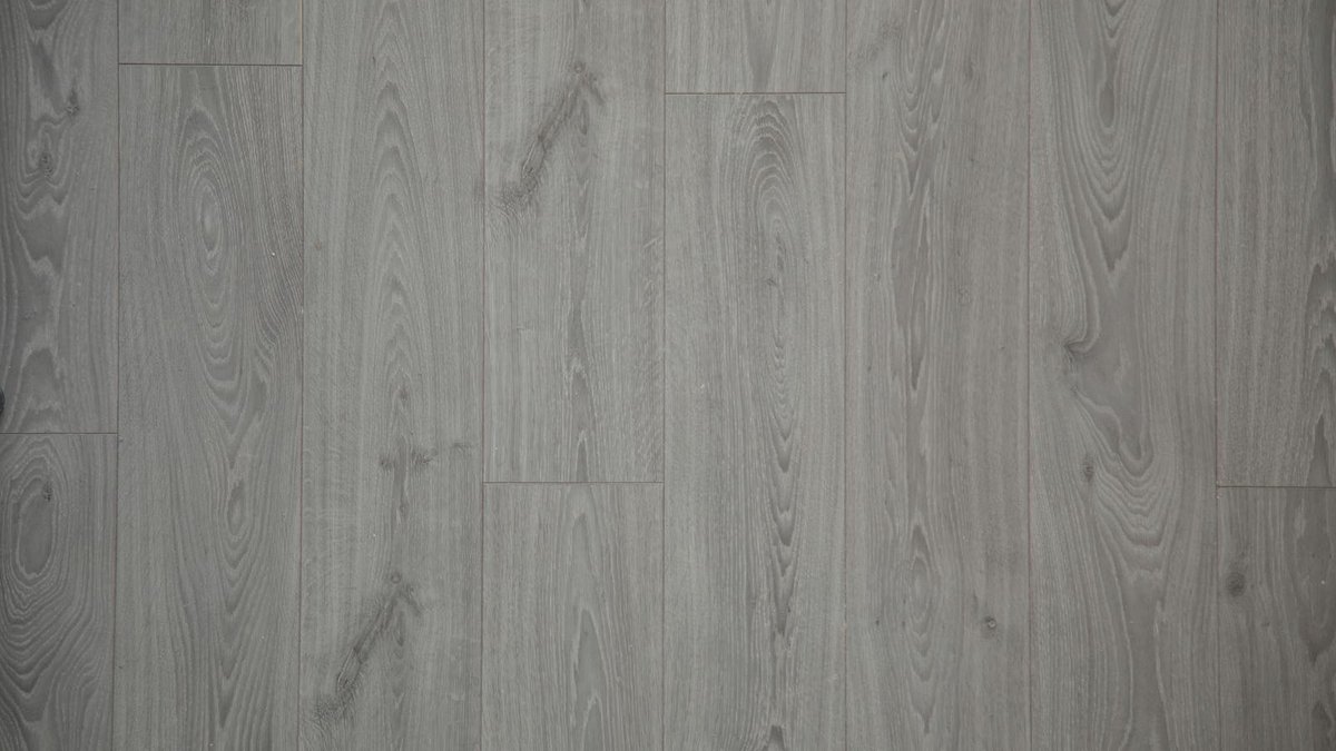 Luxury vinyl plank flooring being installed plank-by-plank